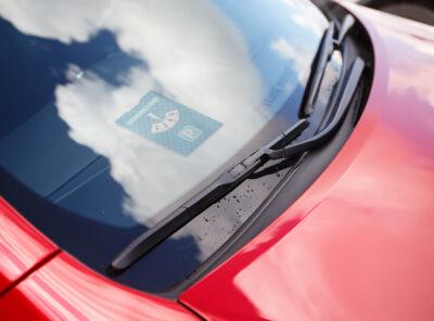 Car wipers on the red car